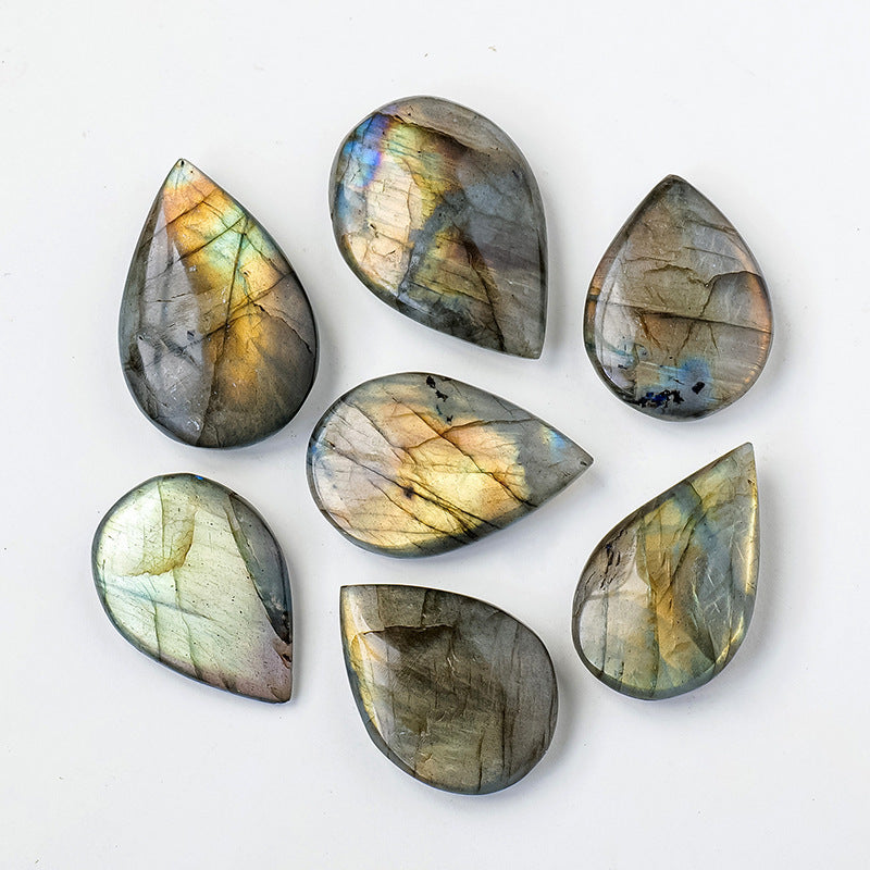 Natural Crystal Blue Light Elongates Stone Droplets